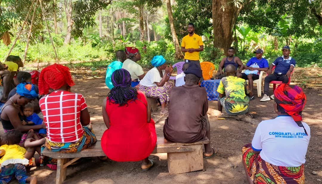 Community members participating in an outdoor project meeting