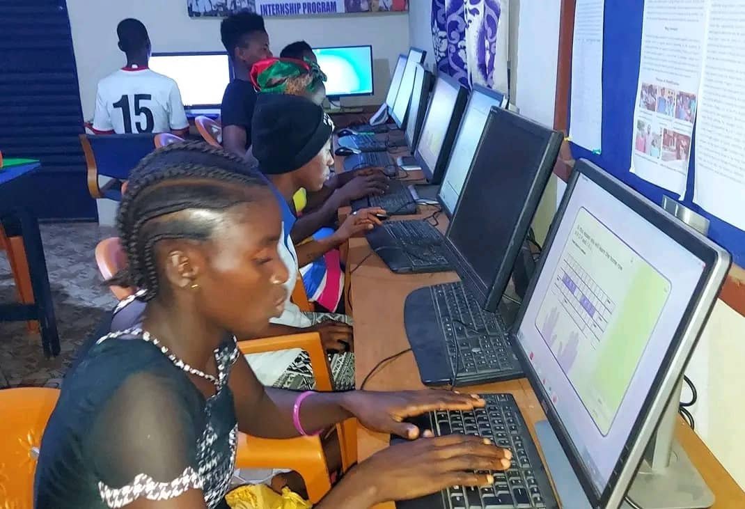Students developing computer skills at Fruitful Healthcare SL